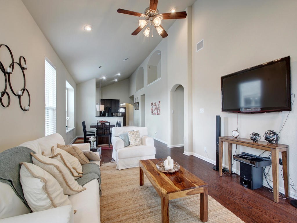 13900 Marathon Road Austin, TX 78717 - Photo 30 of 30 With the arched niches, high ceilings, this photo from when the owner lived there, shows off the floor plan nicely.