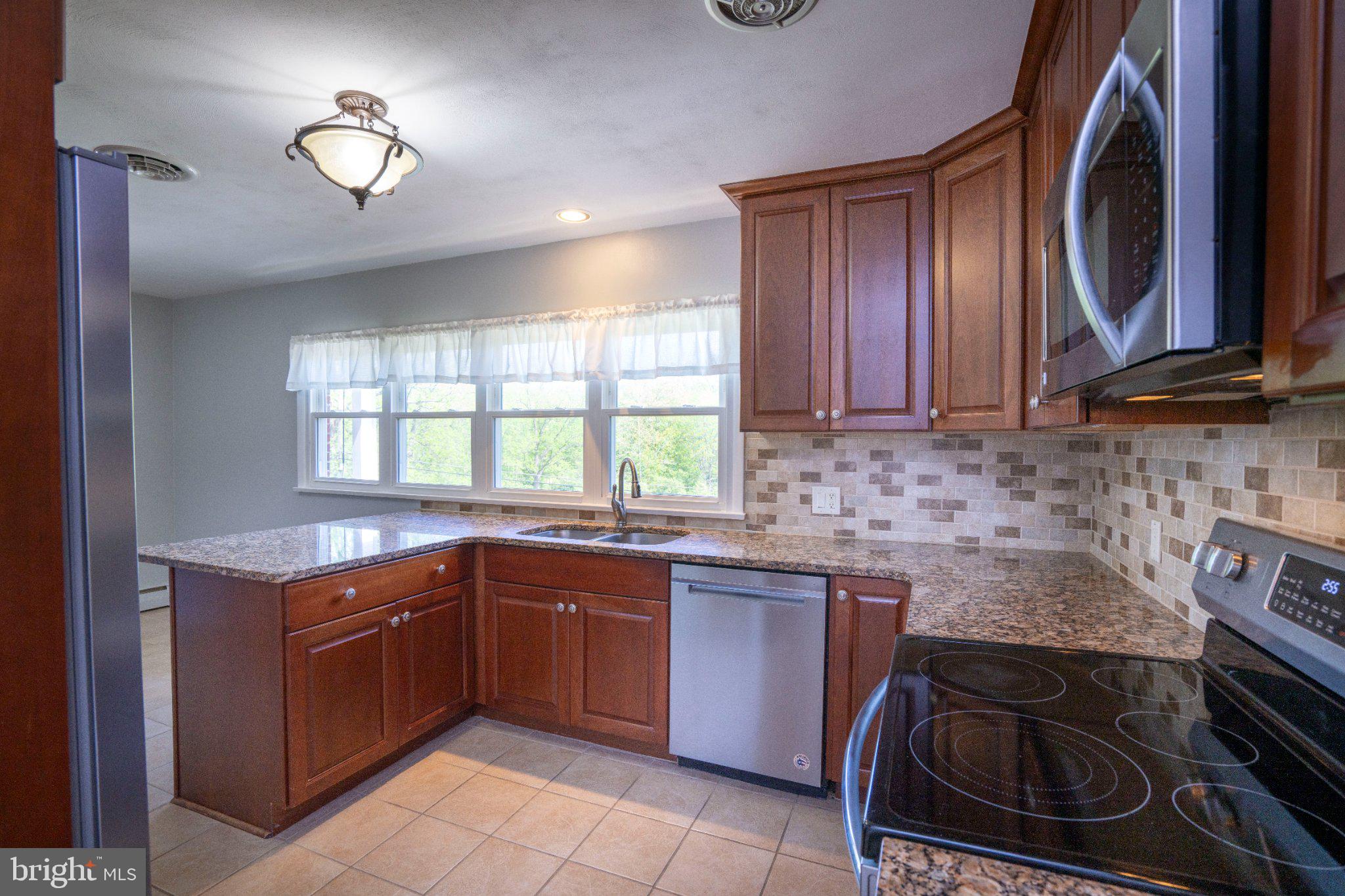 1639 Houserville Road State College, PA 16801 - Photo 24 of 54 Modern kitchen with elegant finishes.
