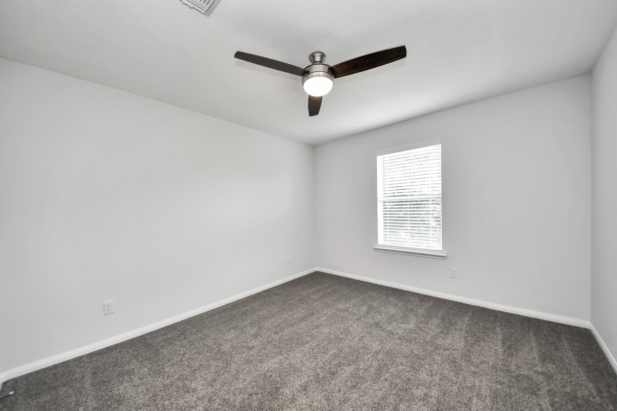 7622 McCormick Mill Court Houston, TX 77095 - Photo 30 of 37 an empty room with a window