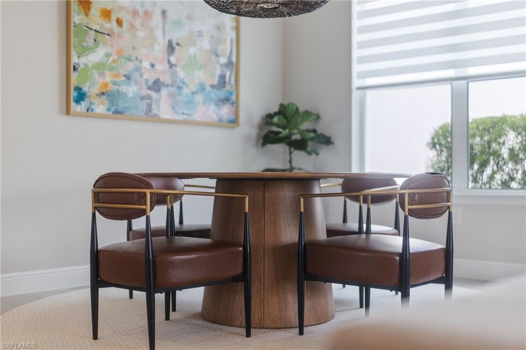 3419 Pilot Circle Naples, FL 34120 - Photo 11 of 39 a dining room with furniture and window