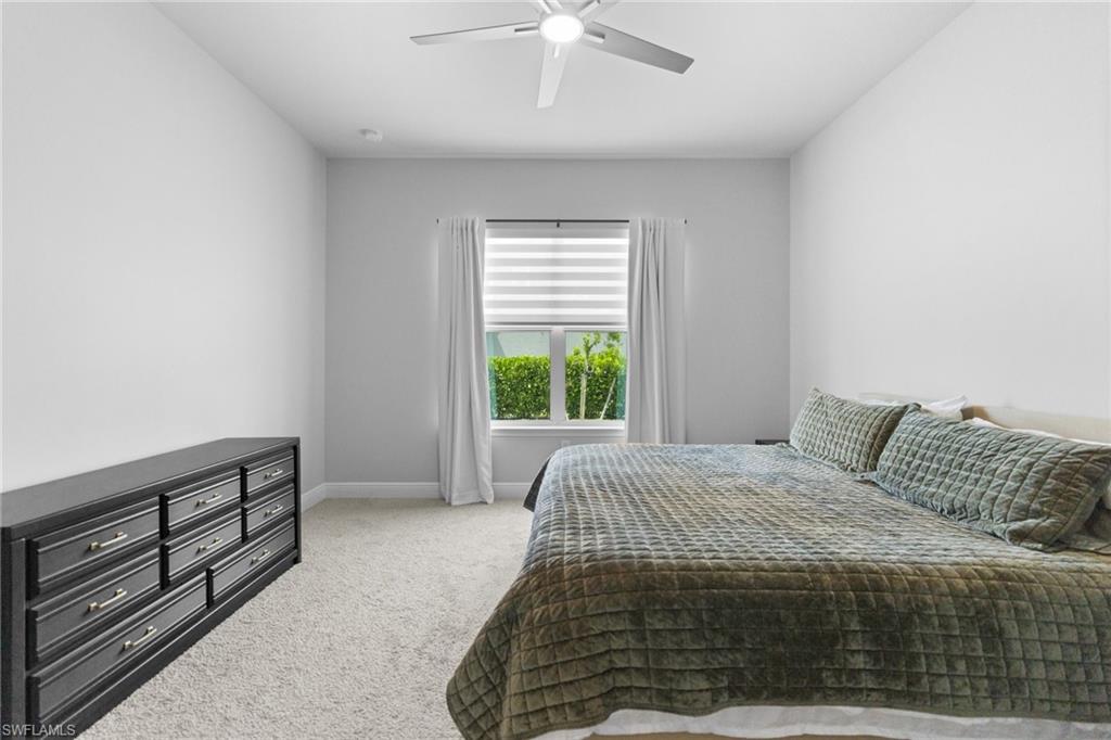 3419 Pilot Circle Naples, FL 34120 - Photo 15 of 39 a bedroom with a bed and a window