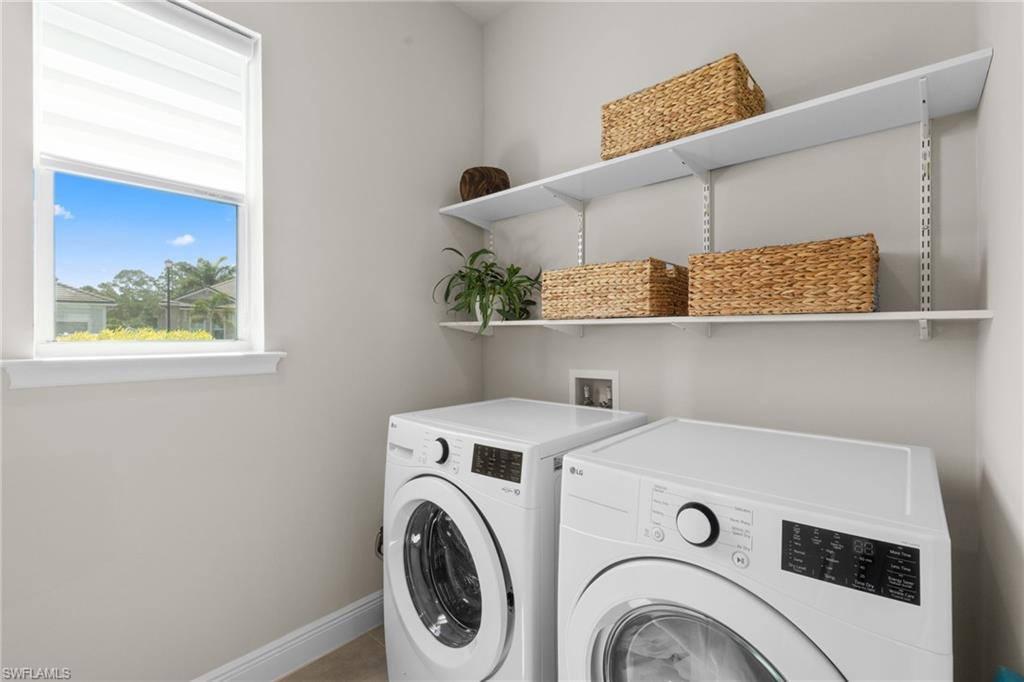 3419 Pilot Circle Naples, FL 34120 - Photo 27 of 39 a utility room with dryer and washer