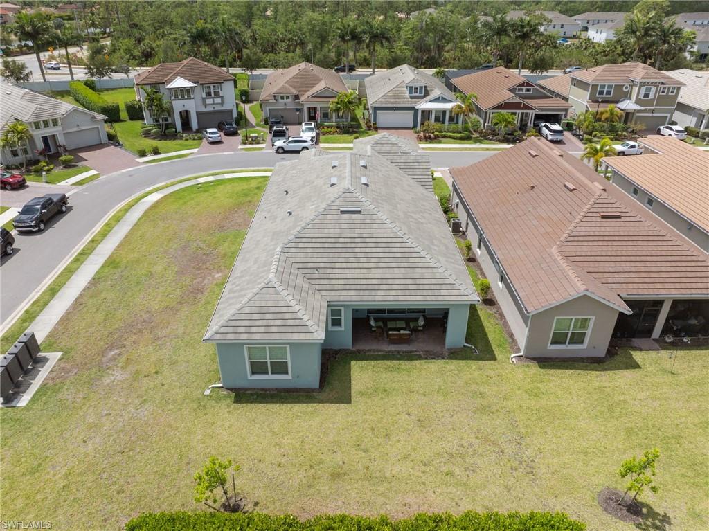3419 Pilot Circle Naples, FL 34120 - Photo 33 of 39 an aerial view of a house with swimming pool