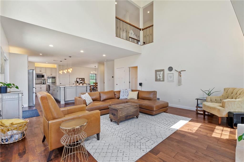 2175 Lovi Road Freedom, PA 15042 - Photo 13 of 36 a living room with furniture and a view of kitchen