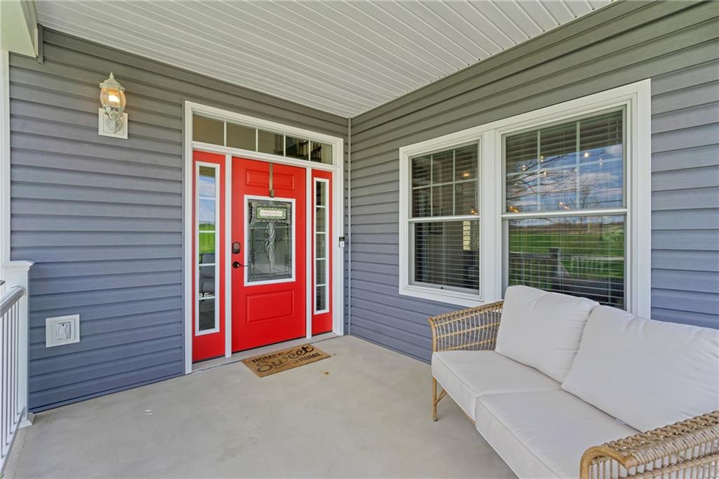 2175 Lovi Road Freedom, PA 15042 - Photo 2 of 36 a balcony with furniture and a window