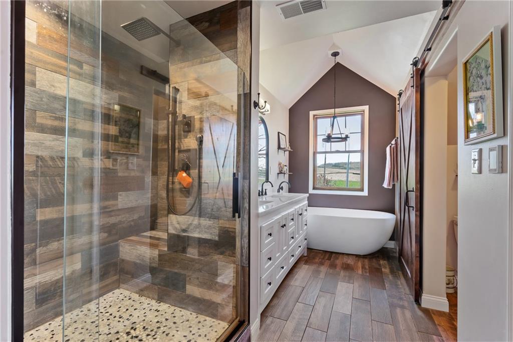 2175 Lovi Road Freedom, PA 15042 - Photo 21 of 36 a bathroom with a bathtub and a shower