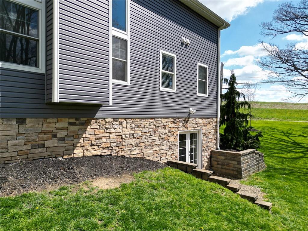 2175 Lovi Road Freedom, PA 15042 - Photo 29 of 36 a view of a small house with backyard and a garden