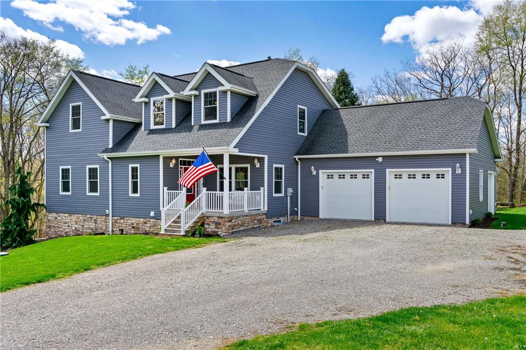 2175 Lovi Road Freedom, PA 15042 - Photo 32 of 36 a front view of a house with garden