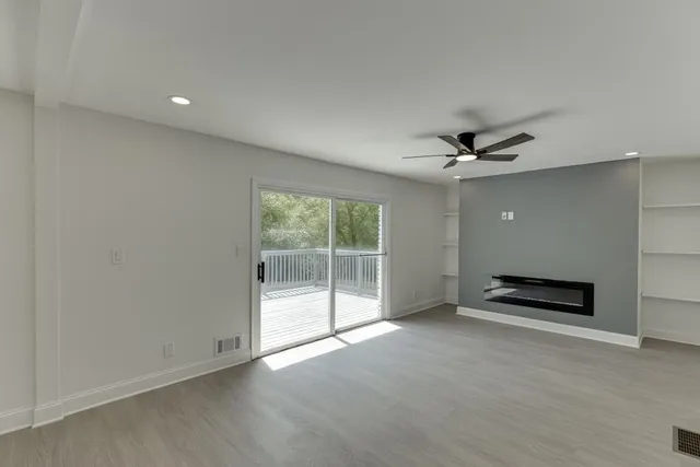a view of a big room with wooden floor