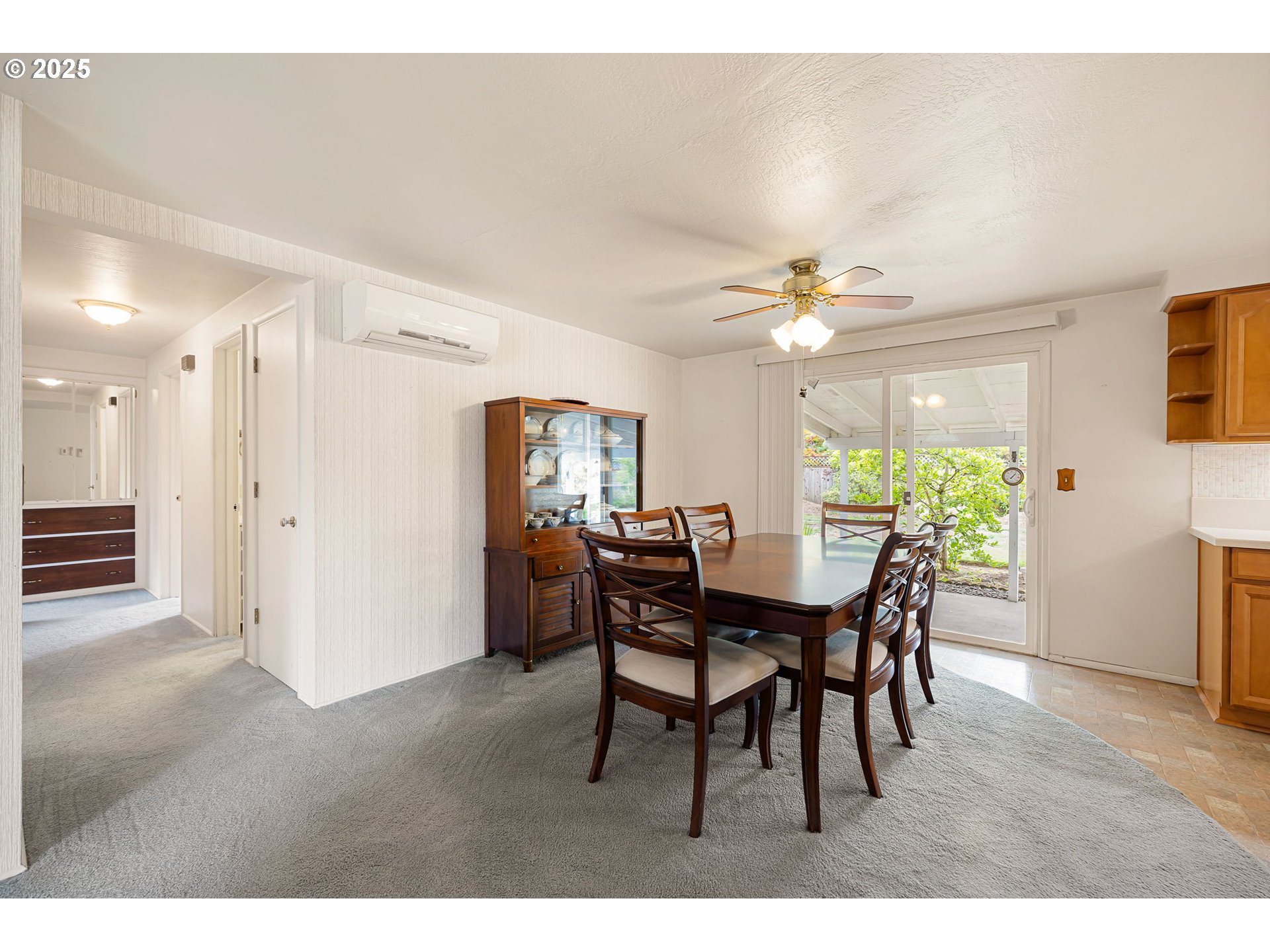 2030 Valhalla Street Eugene, OR 97401 - Photo 12 of 45 a view of a dining room with furniture and a chandelier
