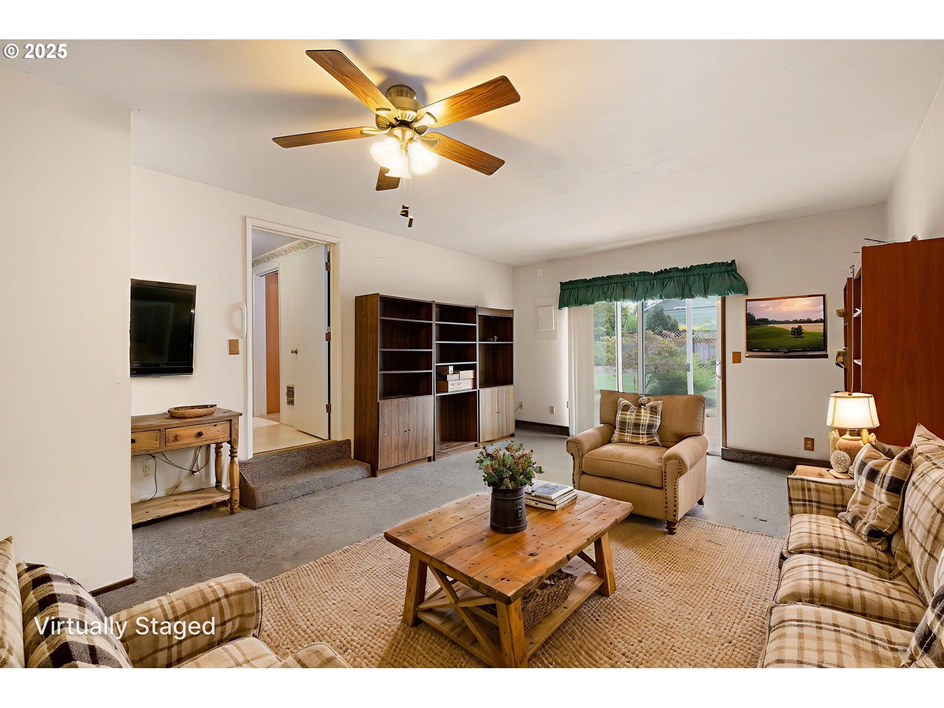 2030 Valhalla Street Eugene, OR 97401 - Photo 23 of 45 a living room with furniture and a flat screen tv