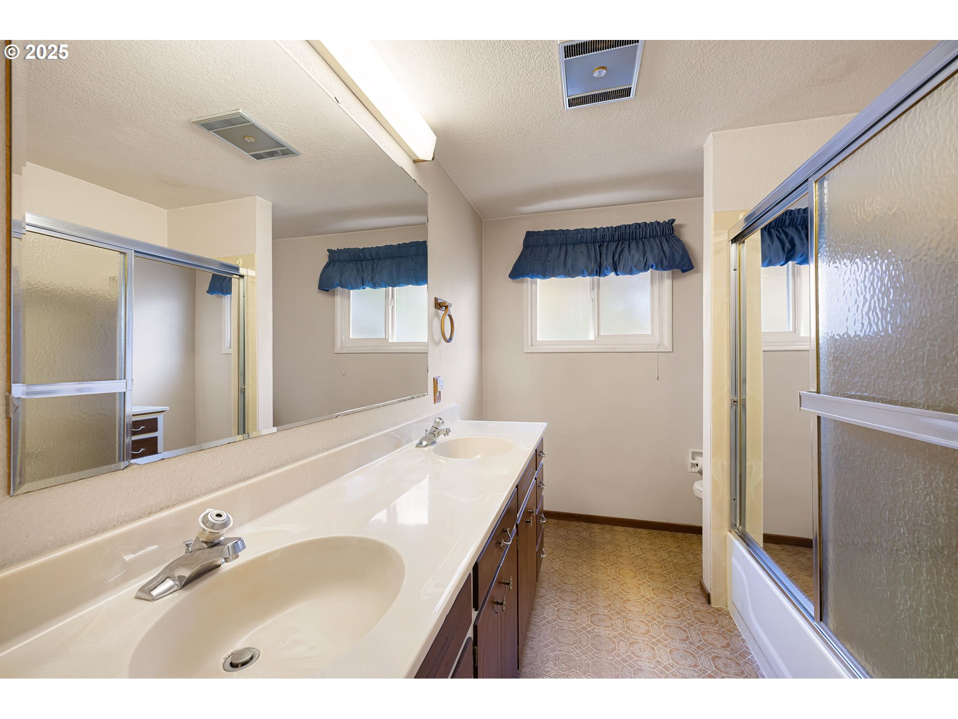 2030 Valhalla Street Eugene, OR 97401 - Photo 29 of 45 a bathroom with a sink and a mirror