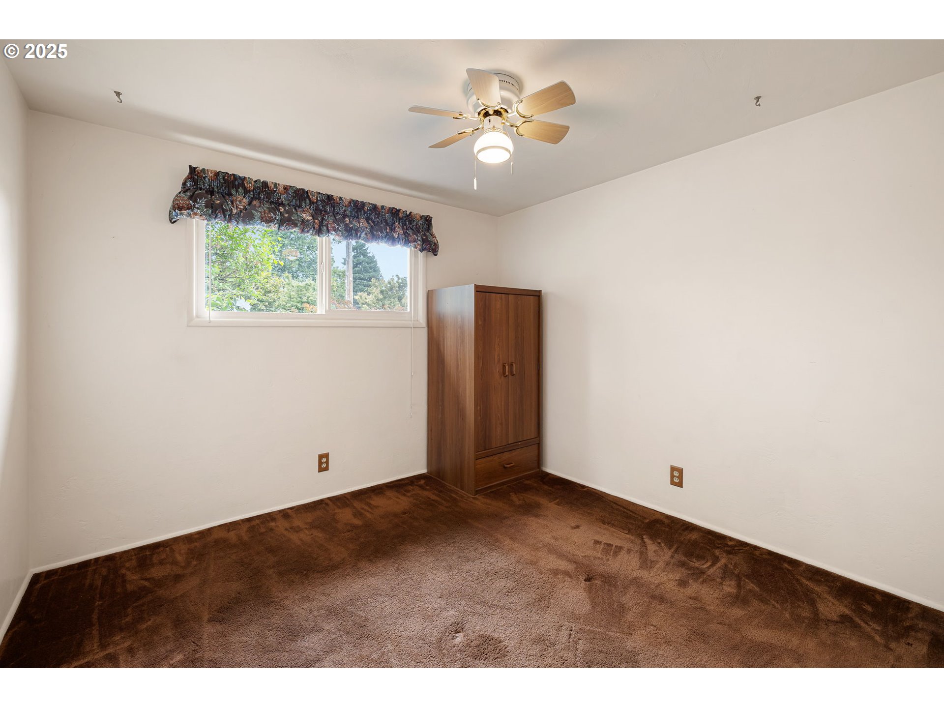2030 Valhalla Street Eugene, OR 97401 - Photo 31 of 45 a view of an empty room with a window