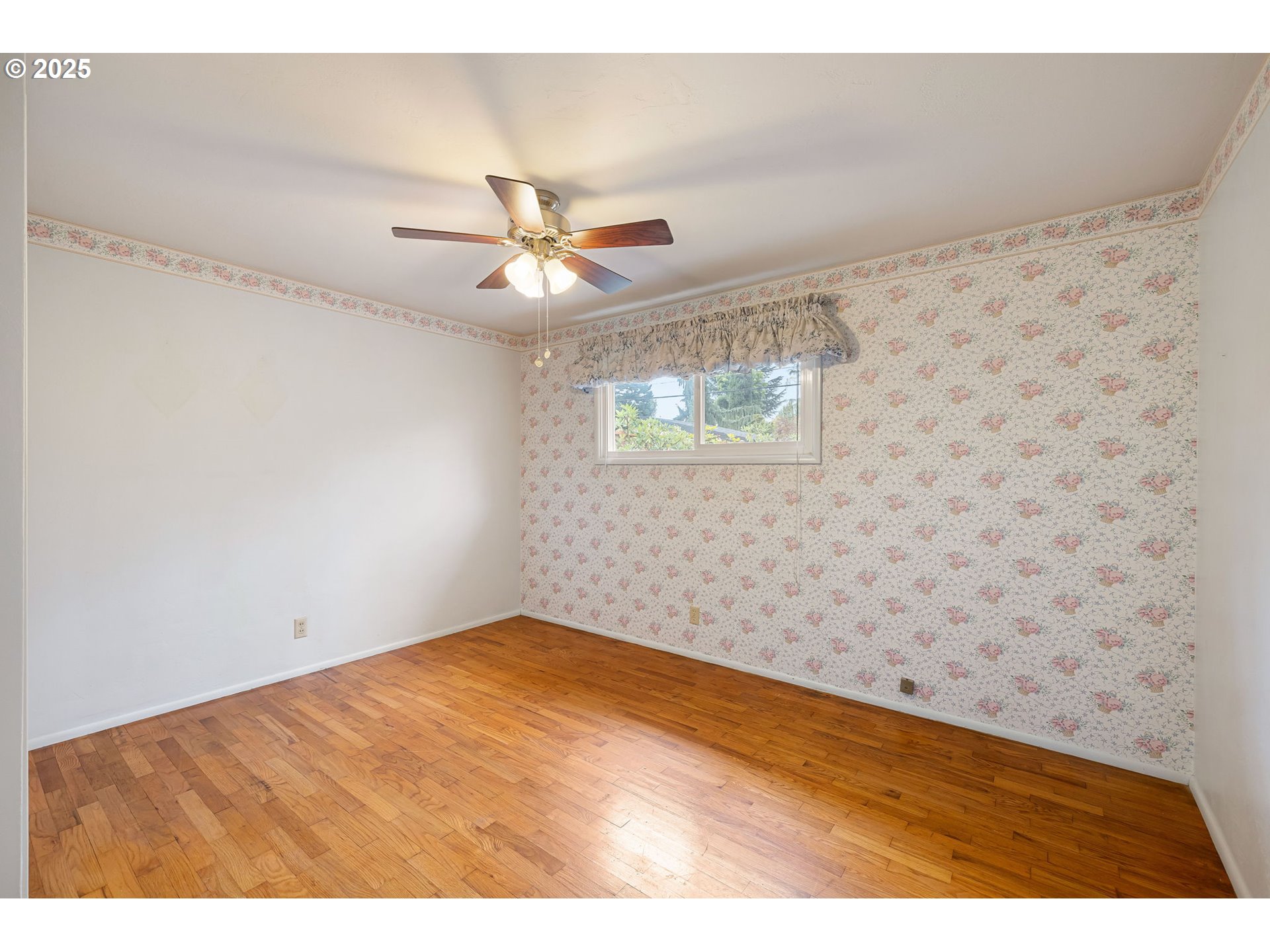 2030 Valhalla Street Eugene, OR 97401 - Photo 34 of 45 a view of empty room with wooden floor