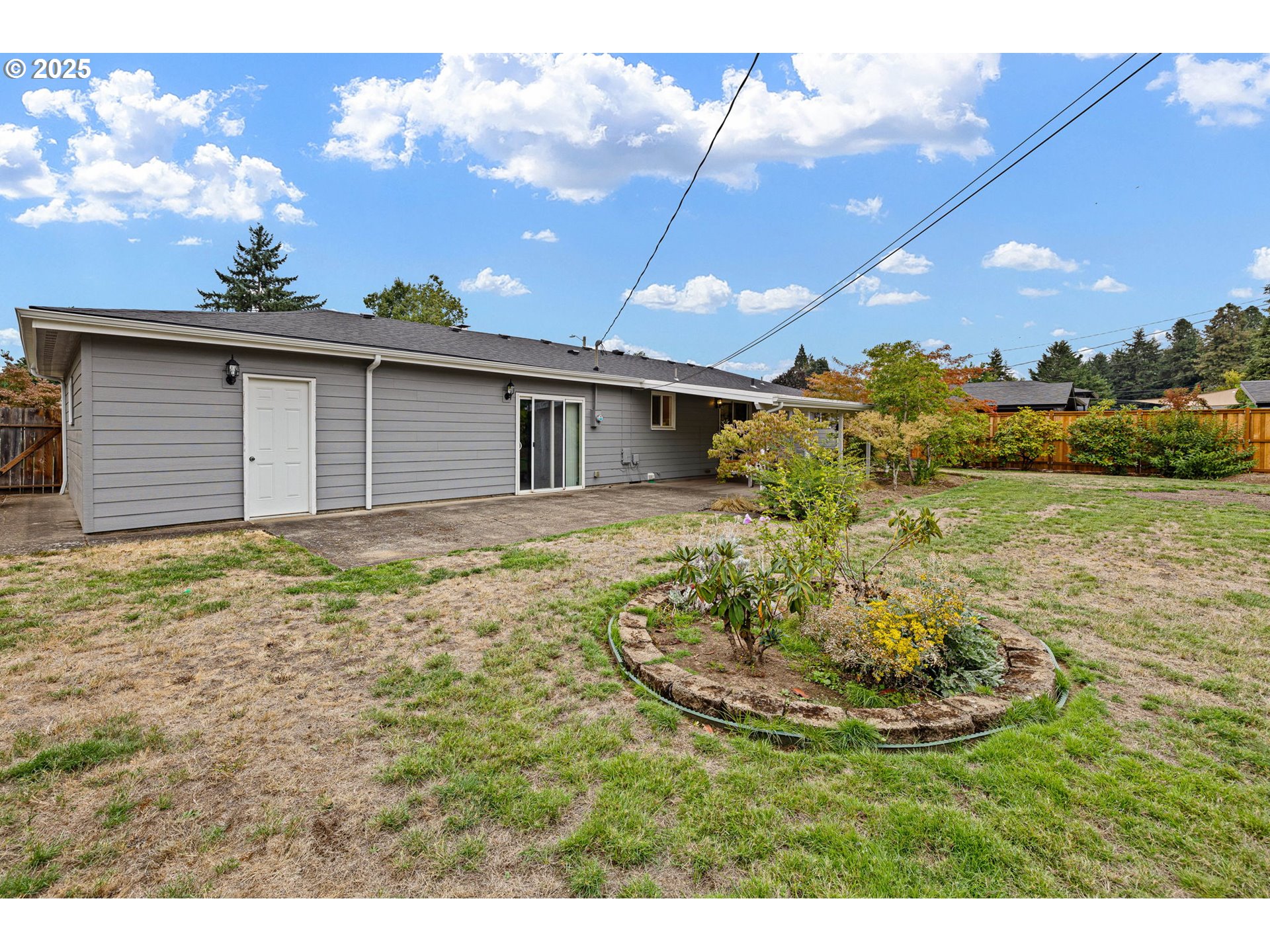 2030 Valhalla Street Eugene, OR 97401 - Photo 42 of 45 a view of a house with a yard