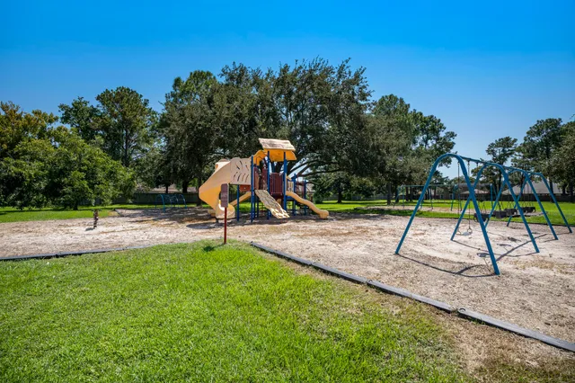 a view of a swimming pool with an outdoor space