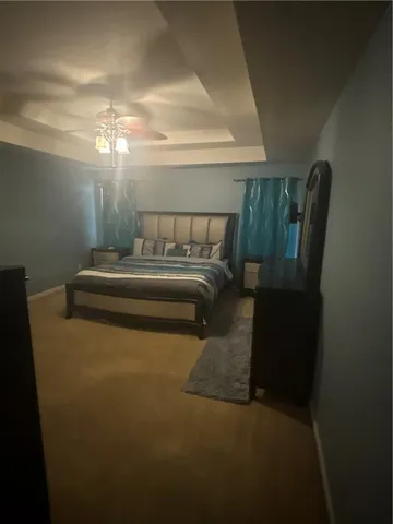 a view of bedroom with furniture