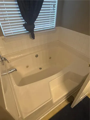a bathroom with a bathtub