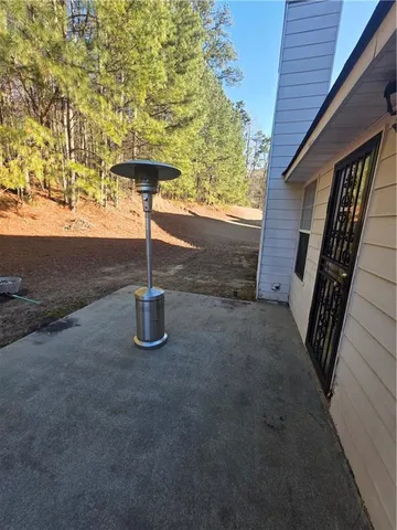 a view of a wooden house with a sink