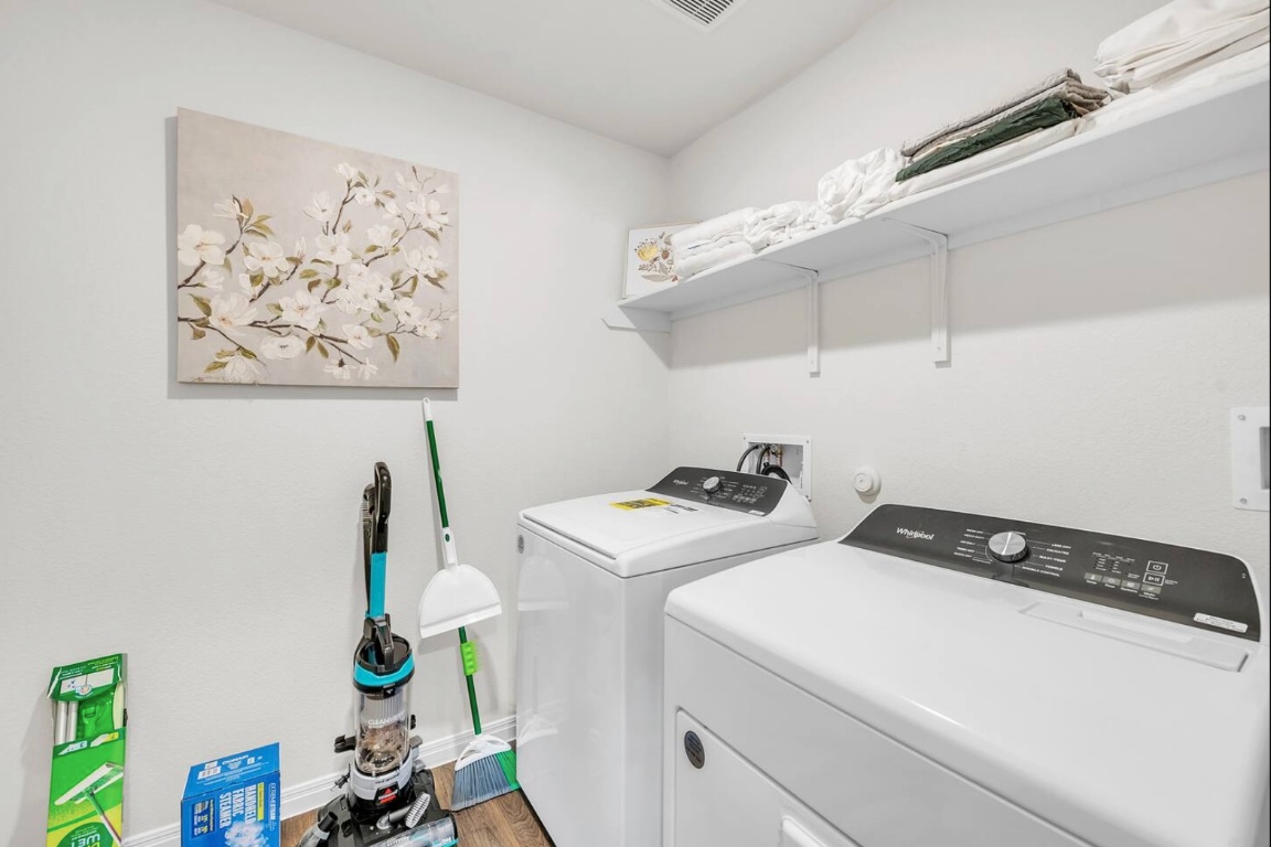 13804 Bothwell Place Manor, TX 78653 - Photo 7 of 7 a utility room with dryer and washer