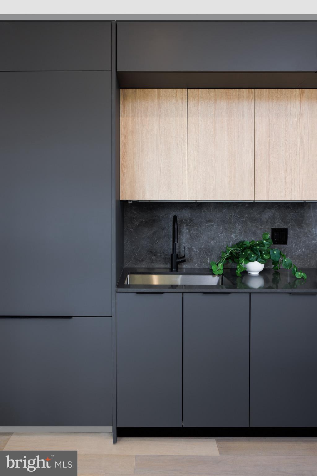 1099 Germantown Avenue, Unit A Philadelphia, PA 19123 - Photo 15 of 53 a kitchen with a sink and cabinets