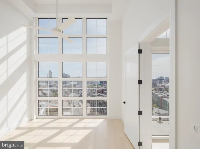 a view of a glass door and a window