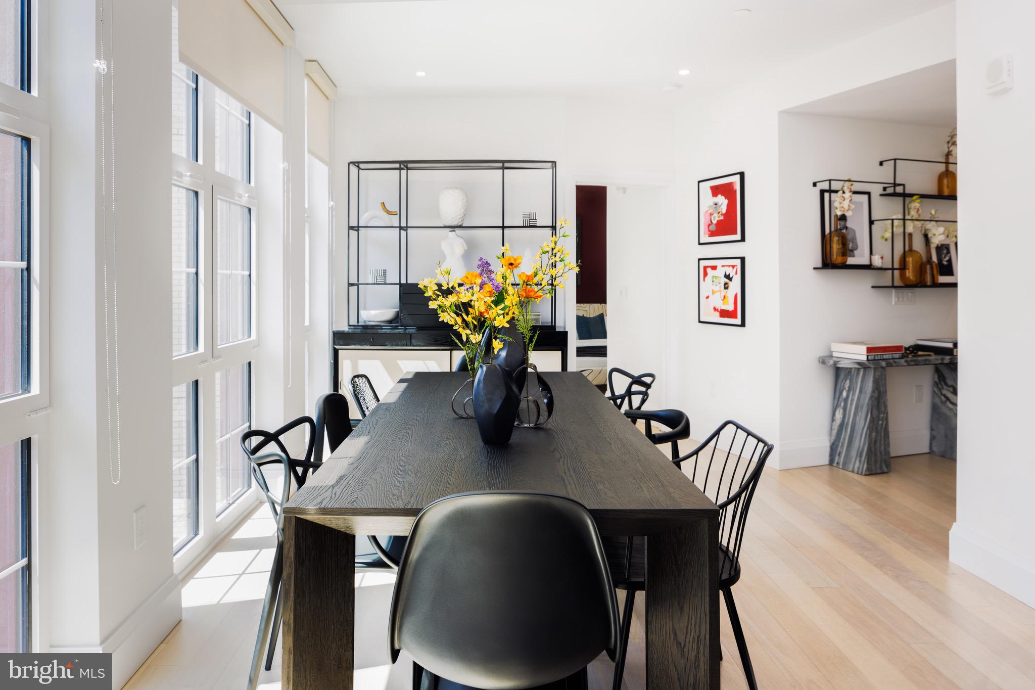 1099 Germantown Avenue, Unit A Philadelphia, PA 19123 - Photo 2 of 53 a view of a dining room with furniture and wooden floor