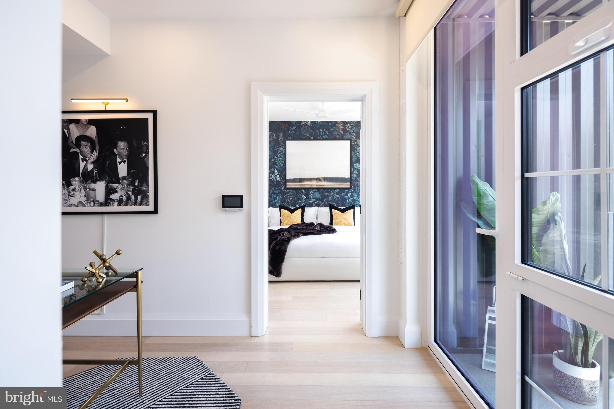 1099 Germantown Avenue, Unit A Philadelphia, PA 19123 - Photo 3 of 53 a bedroom with furniture and a mirror