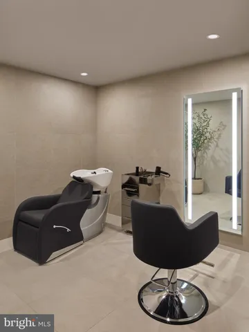 a hallway with a potted plant on a table