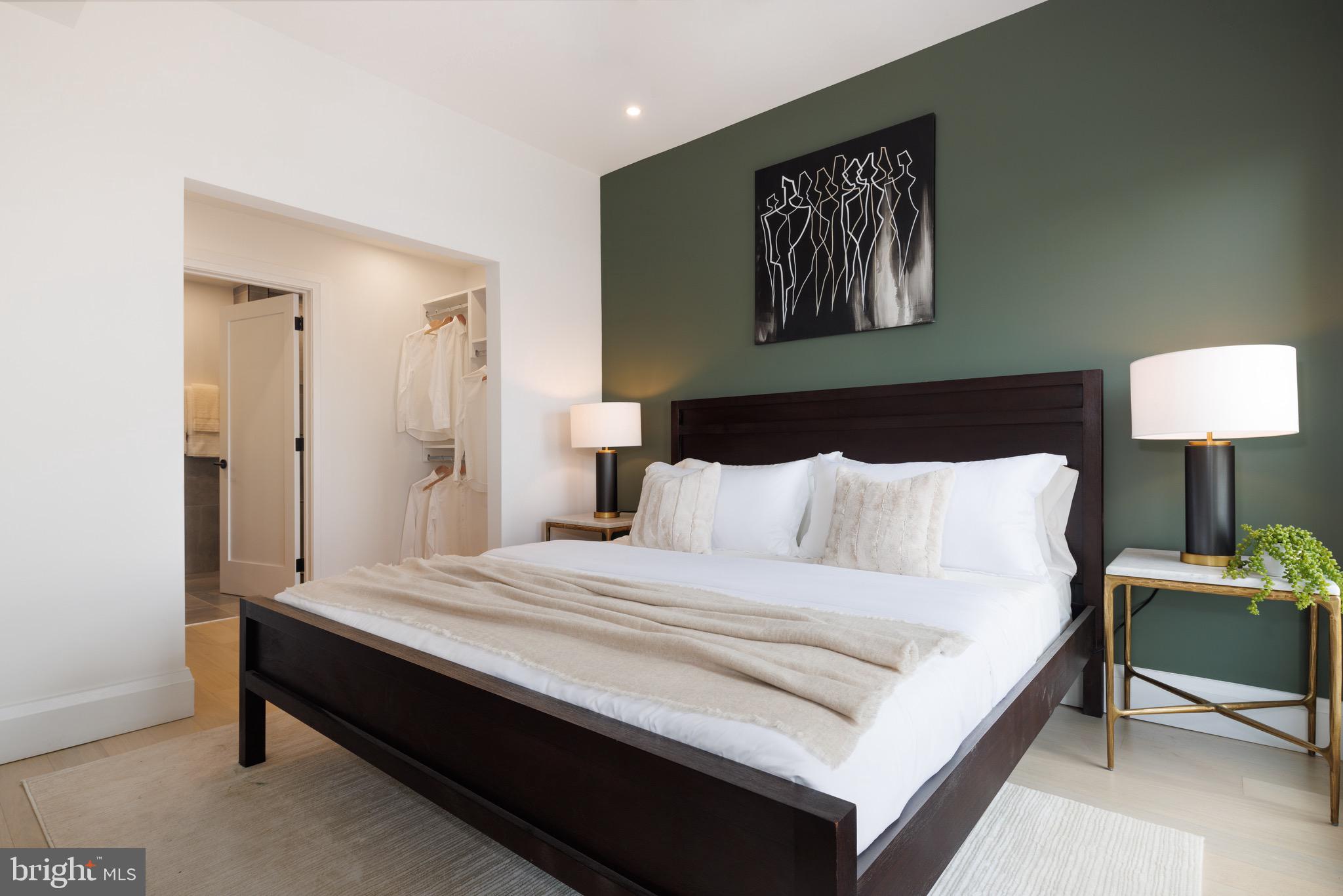 1099 Germantown Avenue, Unit A Philadelphia, PA 19123 - Photo 10 of 53 a large bed sitting in a bedroom and a table