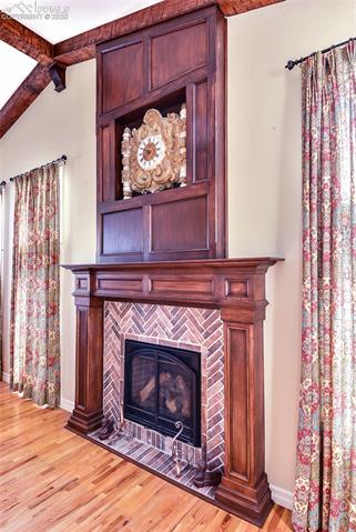 4670 Limestone Road Monument, CO 80132 - Photo 13 of 24 Custom Paneled Gas Log Fireplace