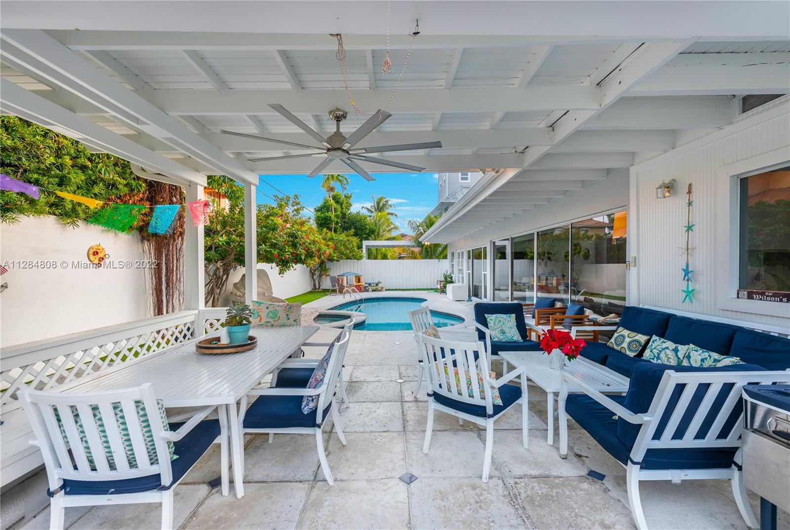 749 Ridgewood Road Key Biscayne, FL 33149 - Photo 29 of 34 a view of a dining room with furniture window and outside view