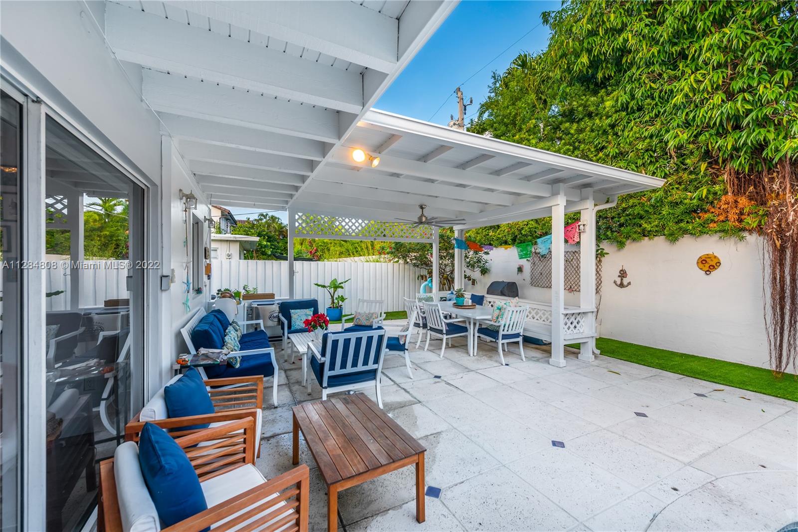 749 Ridgewood Road Key Biscayne, FL 33149 - Photo 31 of 34 an outdoor space with patio lots of water