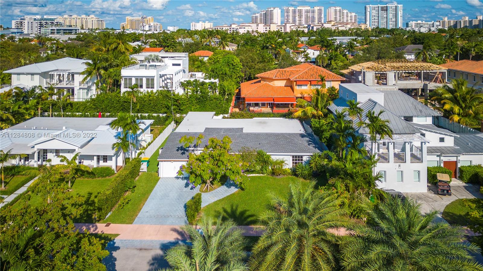 749 Ridgewood Road Key Biscayne, FL 33149 - Photo 34 of 34 an aerial view of multiple houses with yard