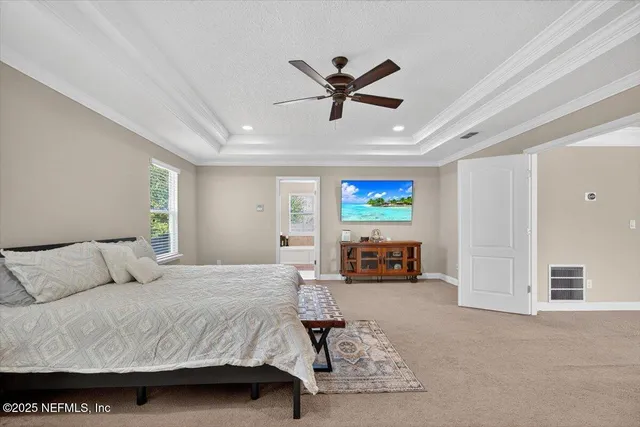a work room with furniture and a window