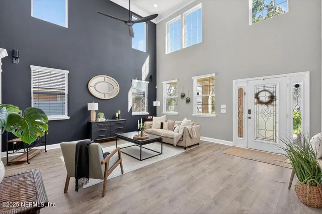 a kitchen with stainless steel appliances kitchen island granite countertop a refrigerator and a stove top oven