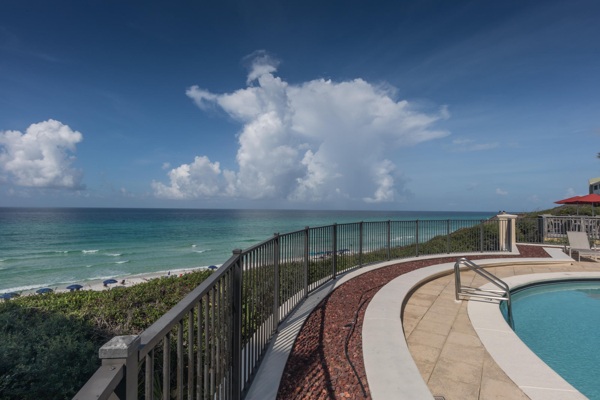 56 Blue Mountain Road, Unit B303 Santa Rosa Beach, FL 32459 - Photo 22 of 47 a balcony with view of swimming pool