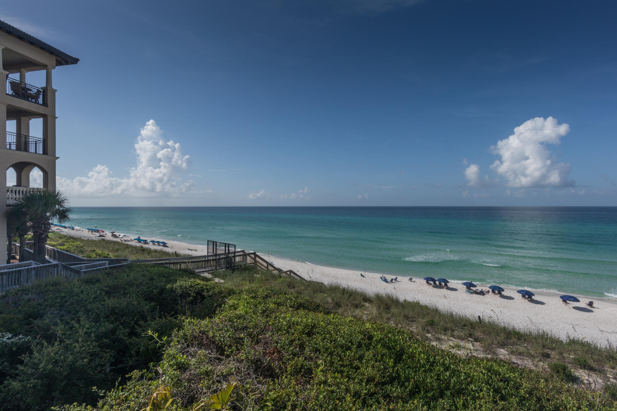56 Blue Mountain Road, Unit B303 Santa Rosa Beach, FL 32459 - Photo 24 of 47 a view of a table and a fireplace in a room