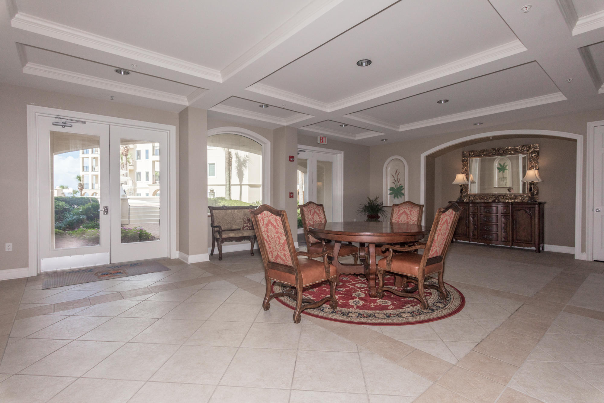 56 Blue Mountain Road, Unit B303 Santa Rosa Beach, FL 32459 - Photo 44 of 47 a view of a dining room with furniture window and wooden floor