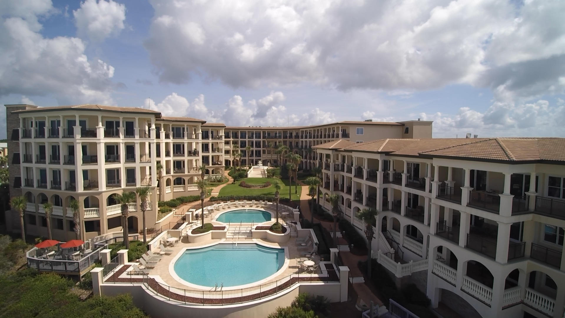 56 Blue Mountain Road, Unit B303 Santa Rosa Beach, FL 32459 - Photo 7 of 47 a balcony with table and chairs