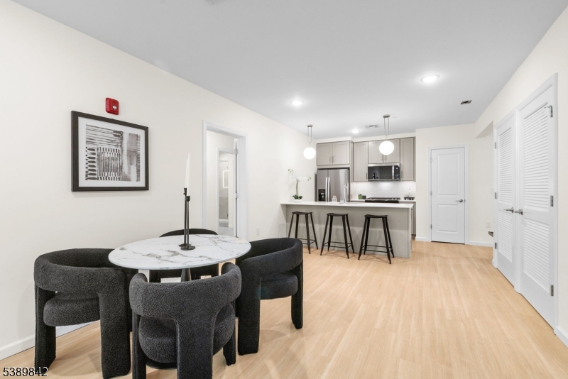 70 Ridgedale Avenue, Unit 205 Morristown, NJ 07960 - Photo 13 of 20 a view of a dining room with furniture