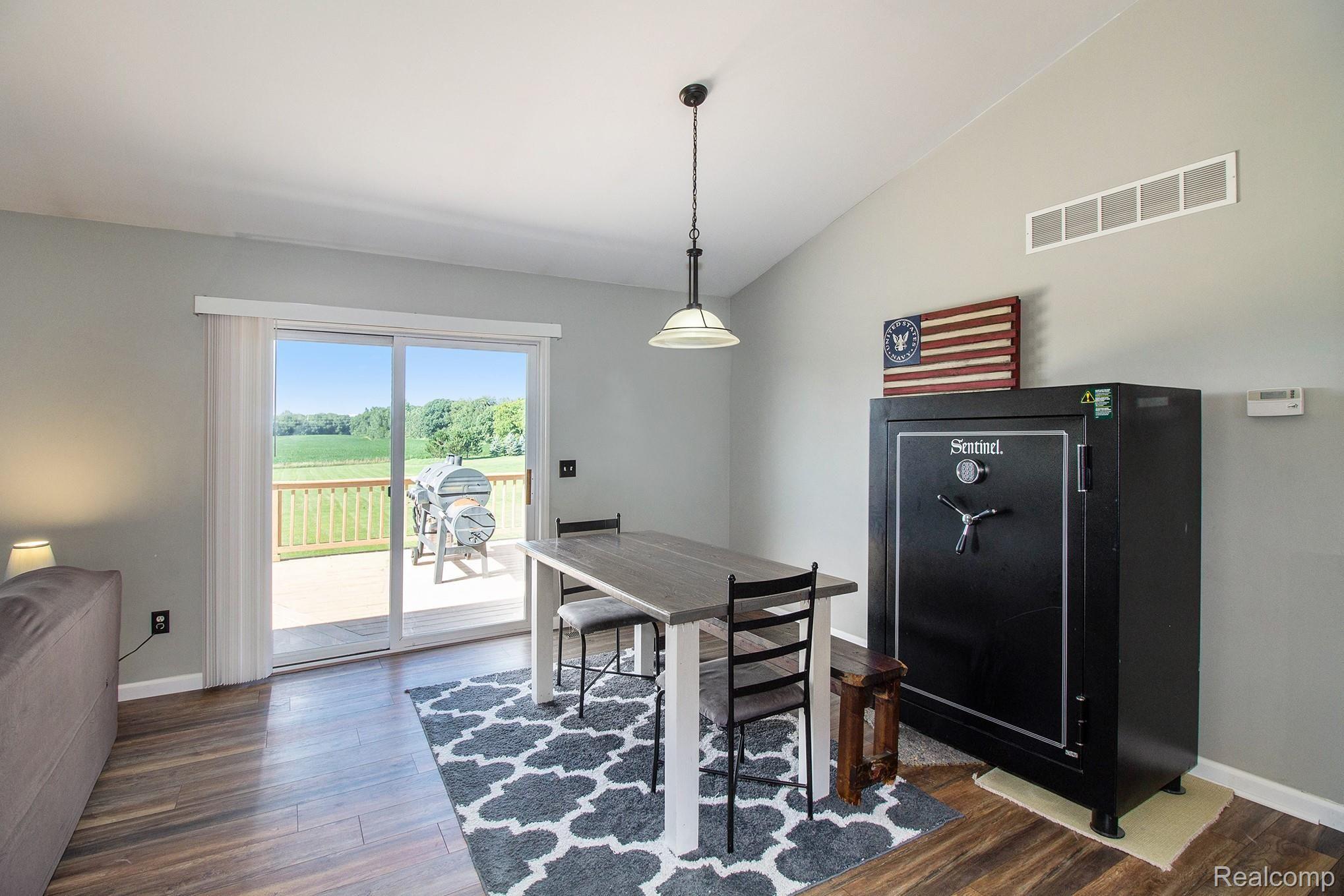 5040 West Coon Lake Road Howell, MI 48843 - Photo 7 of 27 Room for Large Dining room table