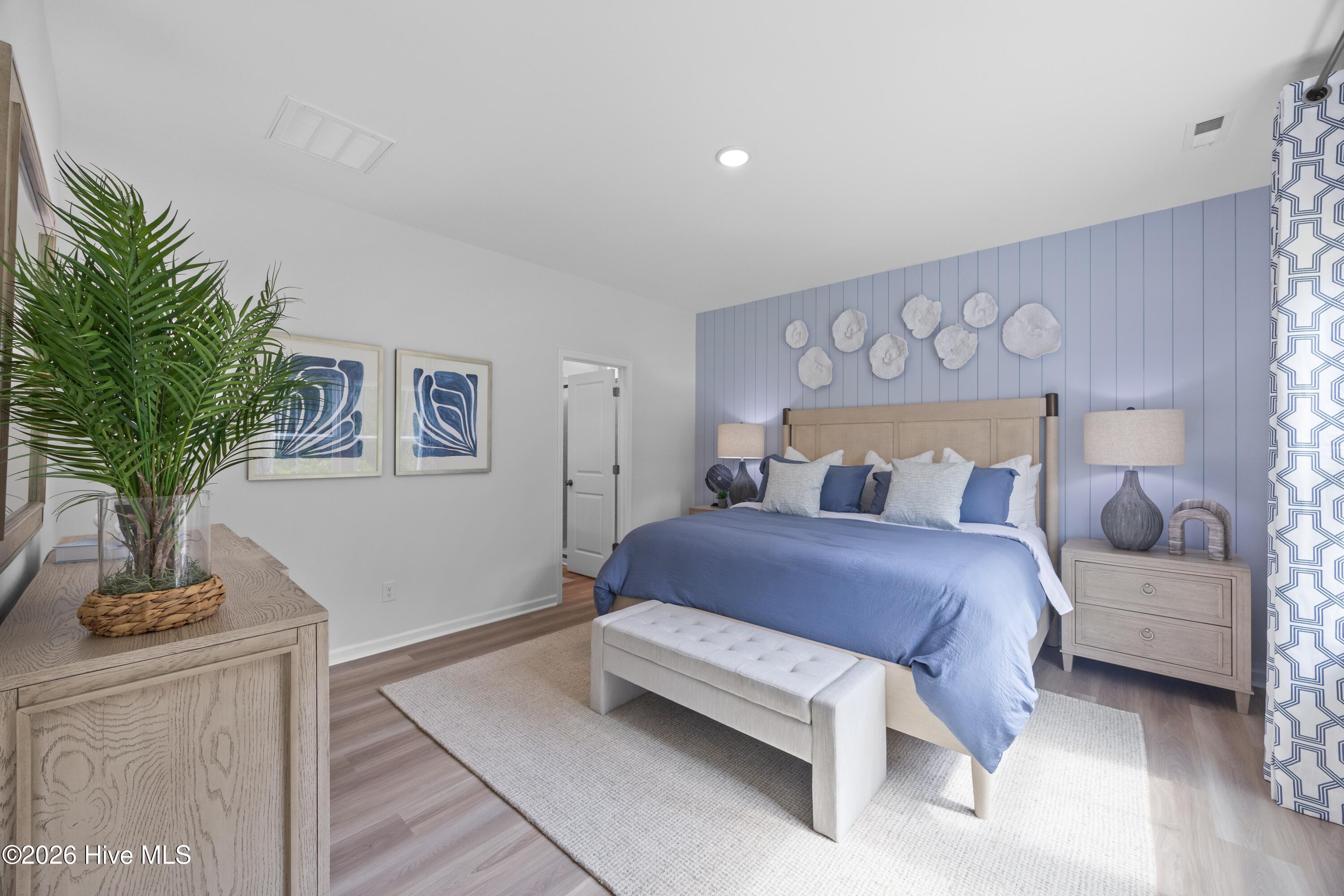 407 Loggerhead Boulevard Hampstead, NC 28443 - Photo 10 of 19 Pebble Primary Bedroom 3