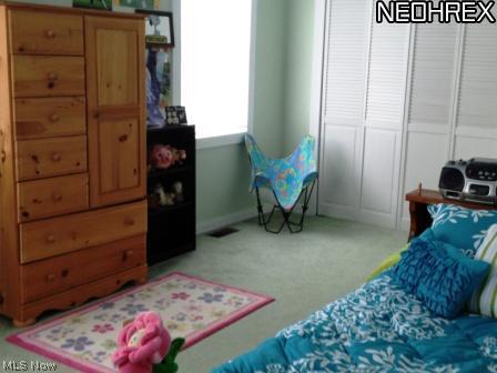 5200 Unger Road Atwater, OH 44201 - Photo 21 of 25 Upstairs to the right, you'll find plenty of closet space in this pretty room!