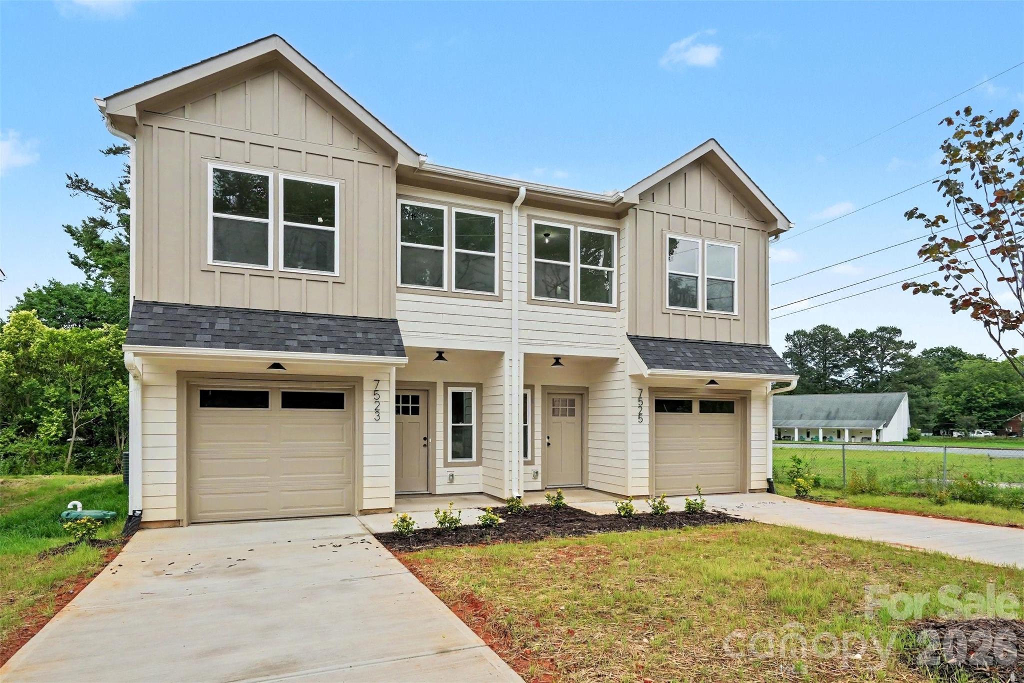 7521 Lawyers Road Charlotte, NC 28227 - Photo 35 of 35 a front view of a house with a yard