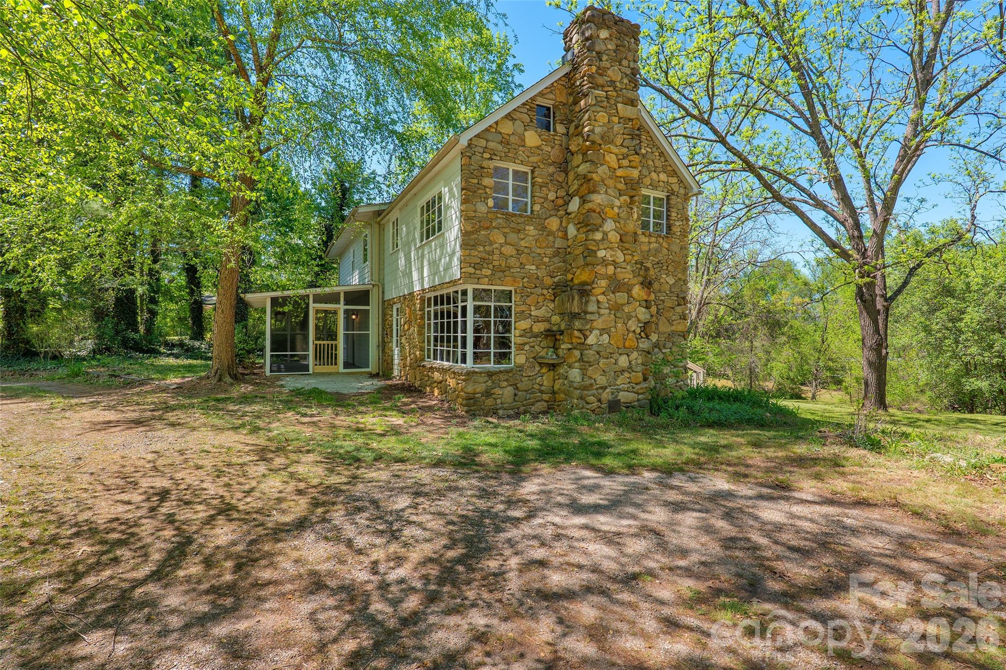 a view of a yard in front of a house
