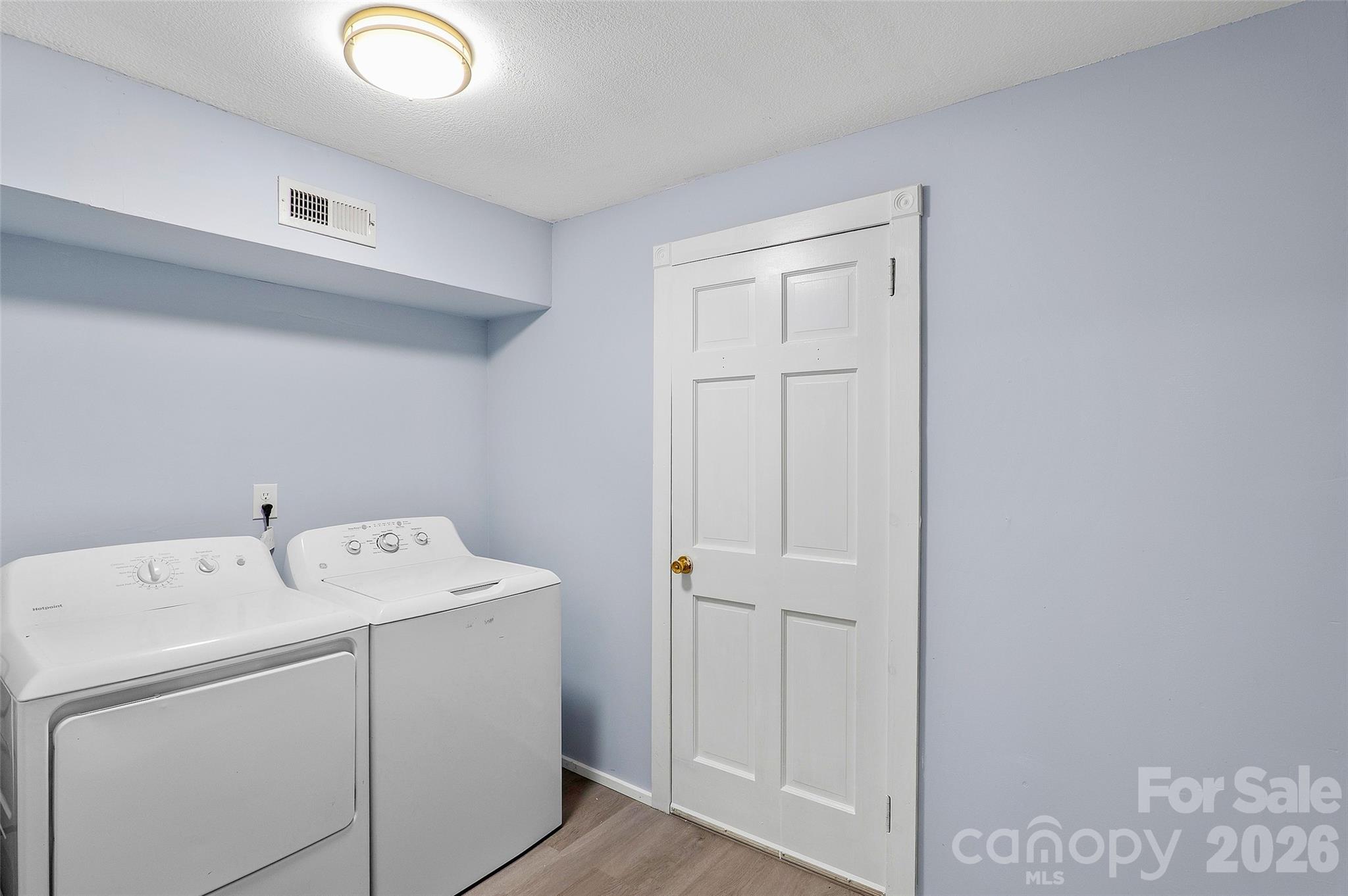 112 Candler School Road Candler, NC 28715 - Photo 15 of 37 a utility room with dryer and washer