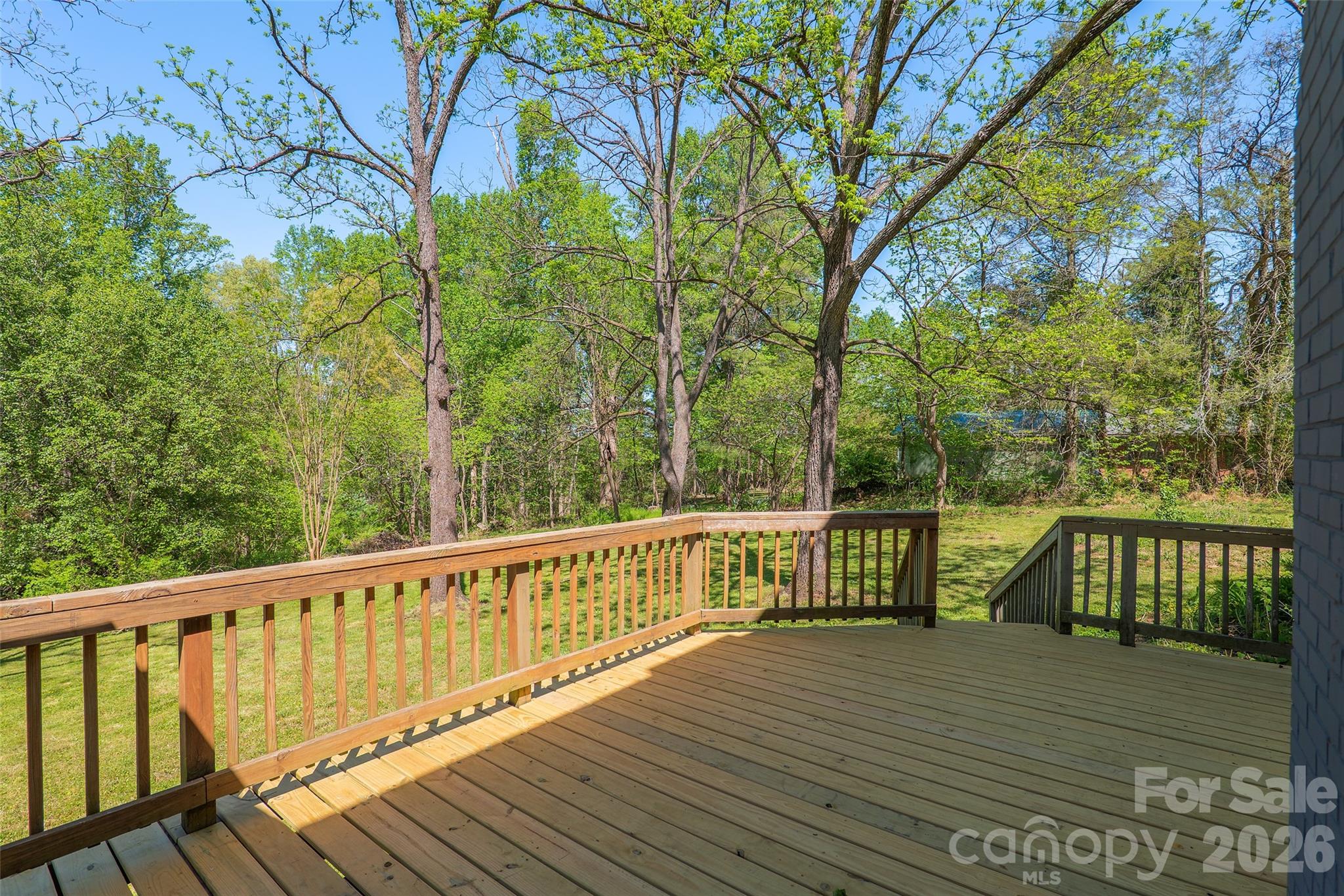 112 Candler School Road Candler, NC 28715 - Photo 19 of 37 a view of balcony with wooden floor and fence