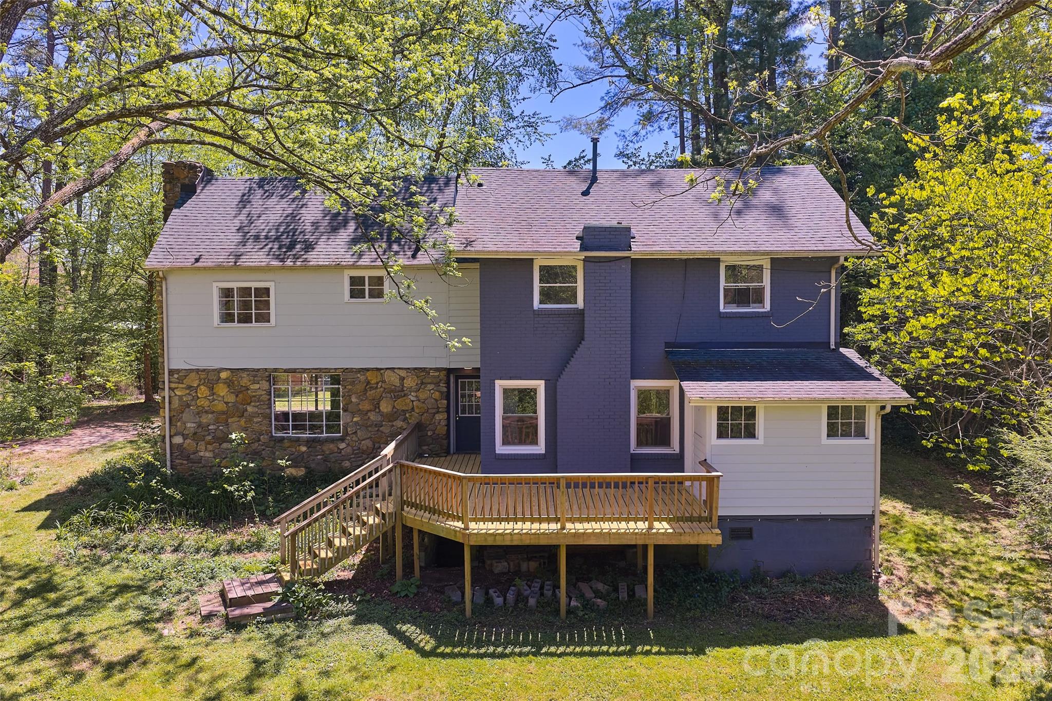112 Candler School Road Candler, NC 28715 - Photo 21 of 37 a aerial view of a house with swimming pool and porch