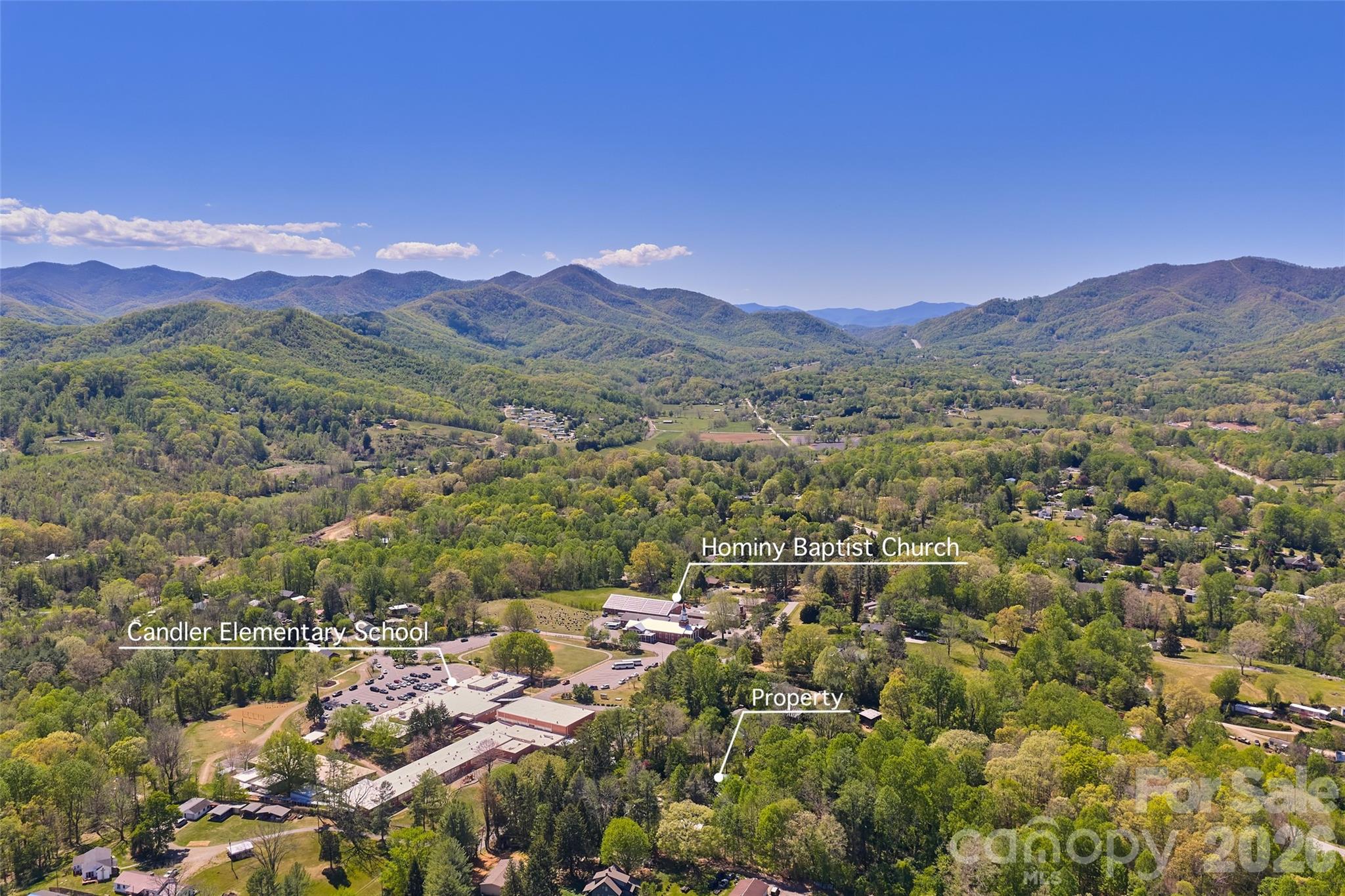 112 Candler School Road Candler, NC 28715 - Photo 35 of 37 a view of a city with mountains in the background